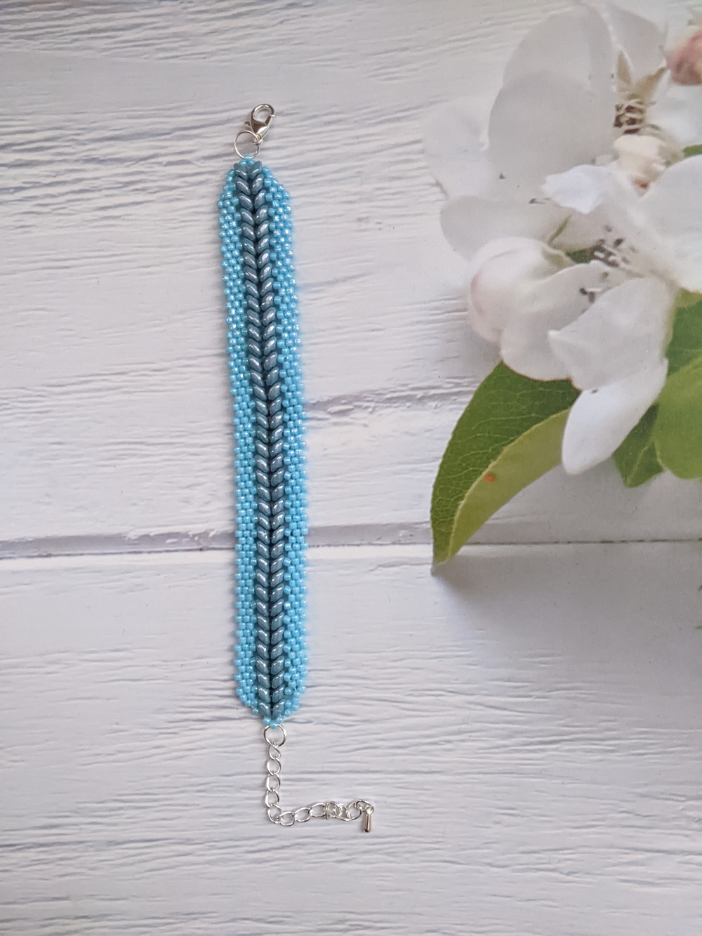 Handcrafted Light Blue Beaded Bracelet with Silver Accent